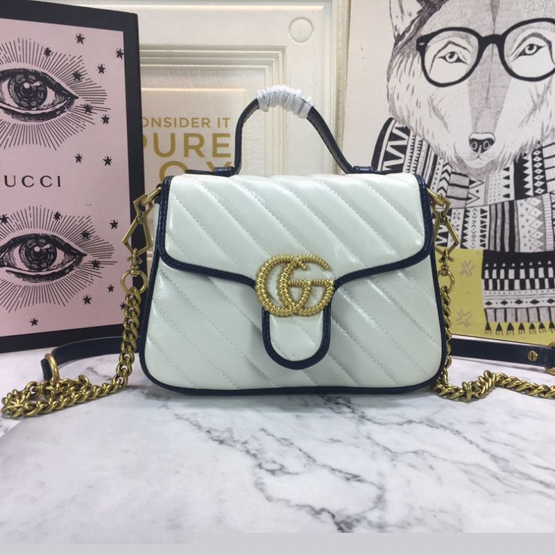 G*u*i top handle bags